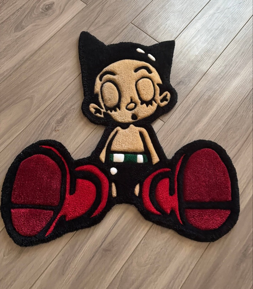 Astro Boy hand-tufted rug on a wood floor